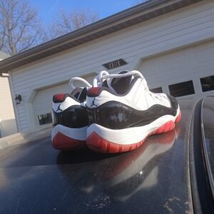 Jordan Kids Black, White, and Red Sneakers